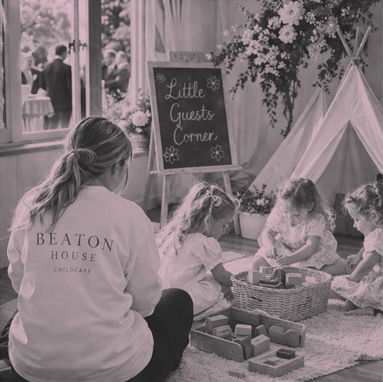 Children crafting with childcare worker